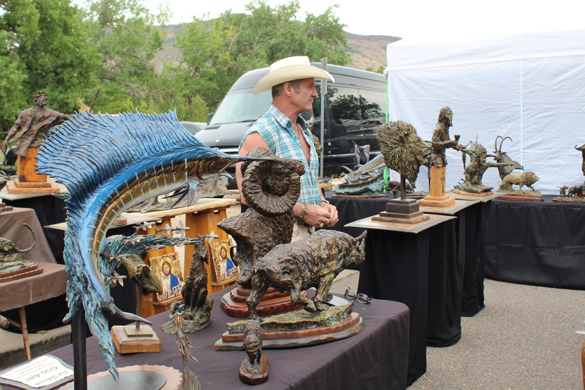 Thornton's Theodore Schnack showcases his bronze sculptures at the Golden Fine Arts Festival Aug. 20 in downtown Golden.